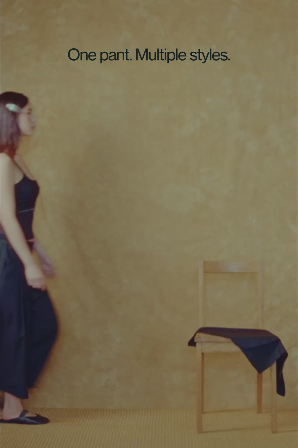 Video showing female model putting on the attachment panel of the wings