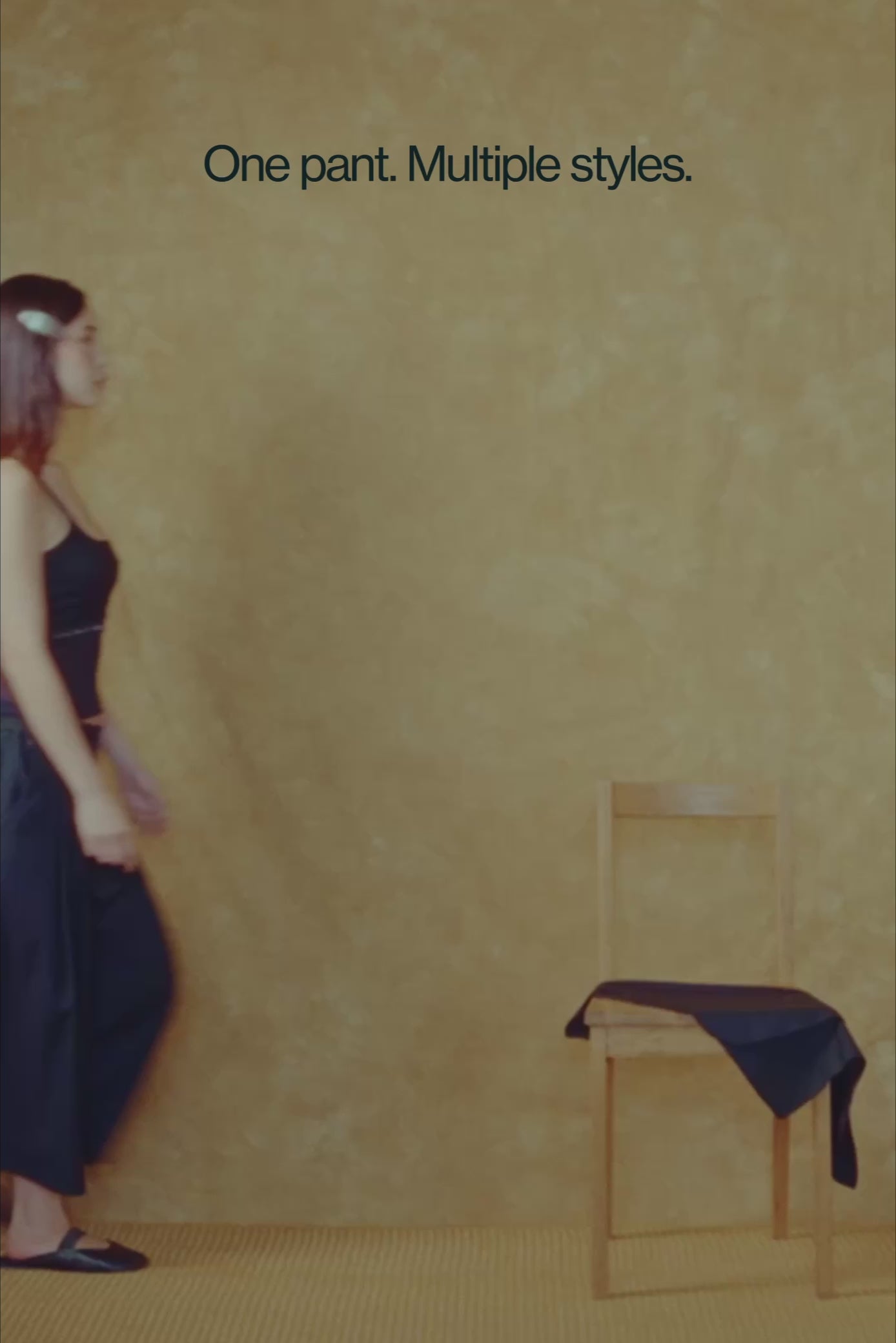 Video showing female model putting on the attachment panel of the wings